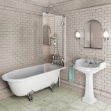 Product Lifestyle image of the Burlington Bath Screen mounted above the Hampton Freestanding Shower Bath
